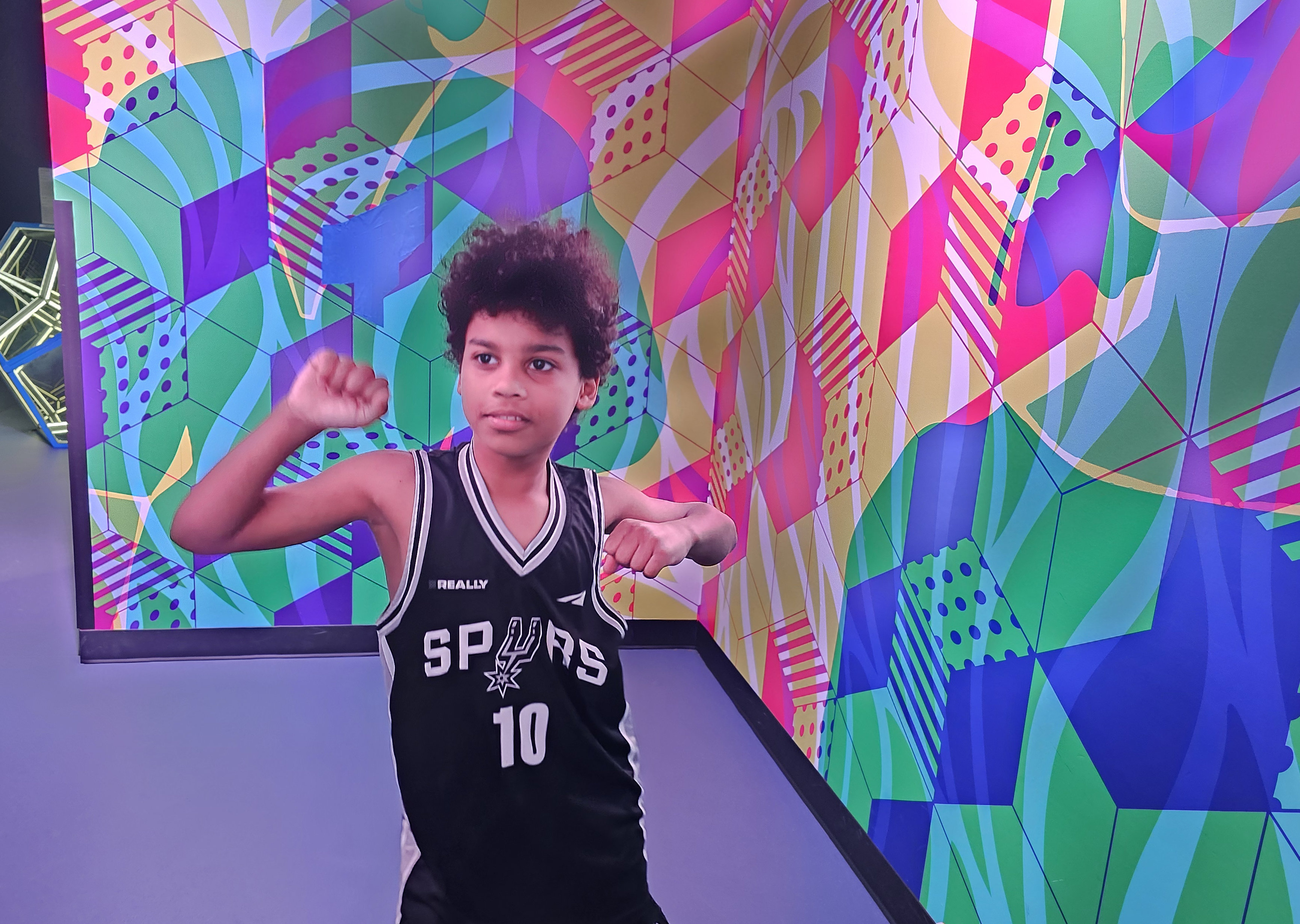 A photo of Isaiah dancing